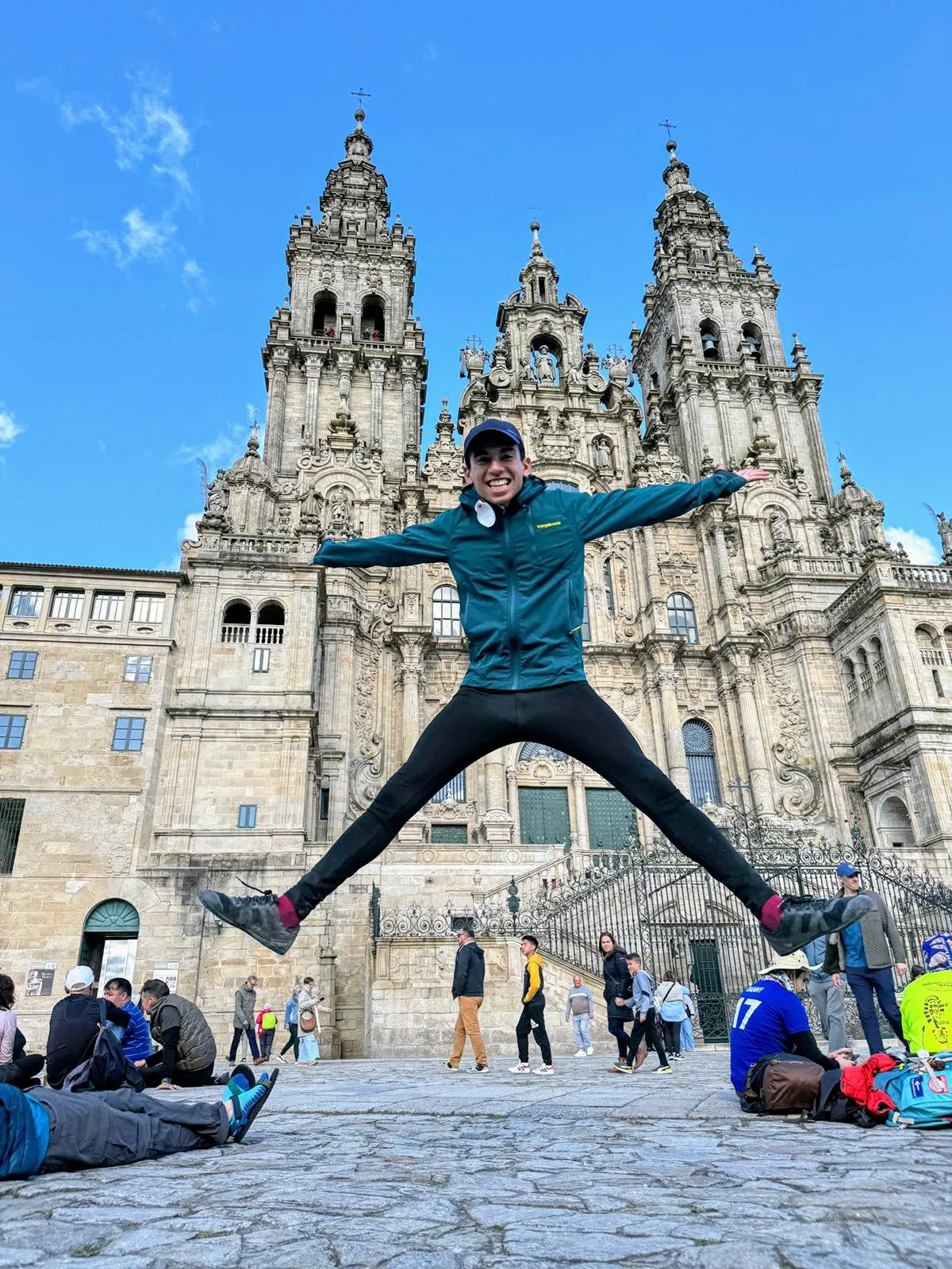 Anurag Mehra jumping in front of a cathedral